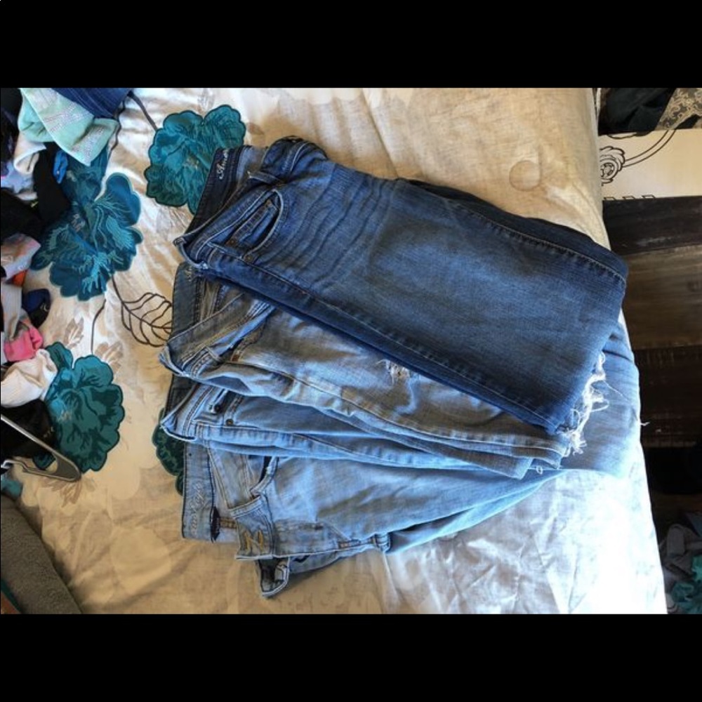 Four pairs of women’s American Eagle jeans